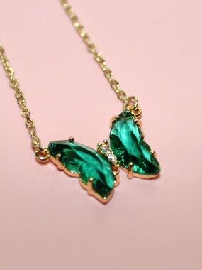 Gold Butterfly Necklace with Emerald Green Crystal Wings